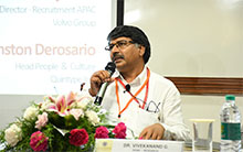 Dr. Vivekanand G Dean Research, Alliance University moderating a panel discussion