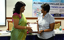 Ms. Divya Anand, Director-HR Cleartrip.com being felicitated